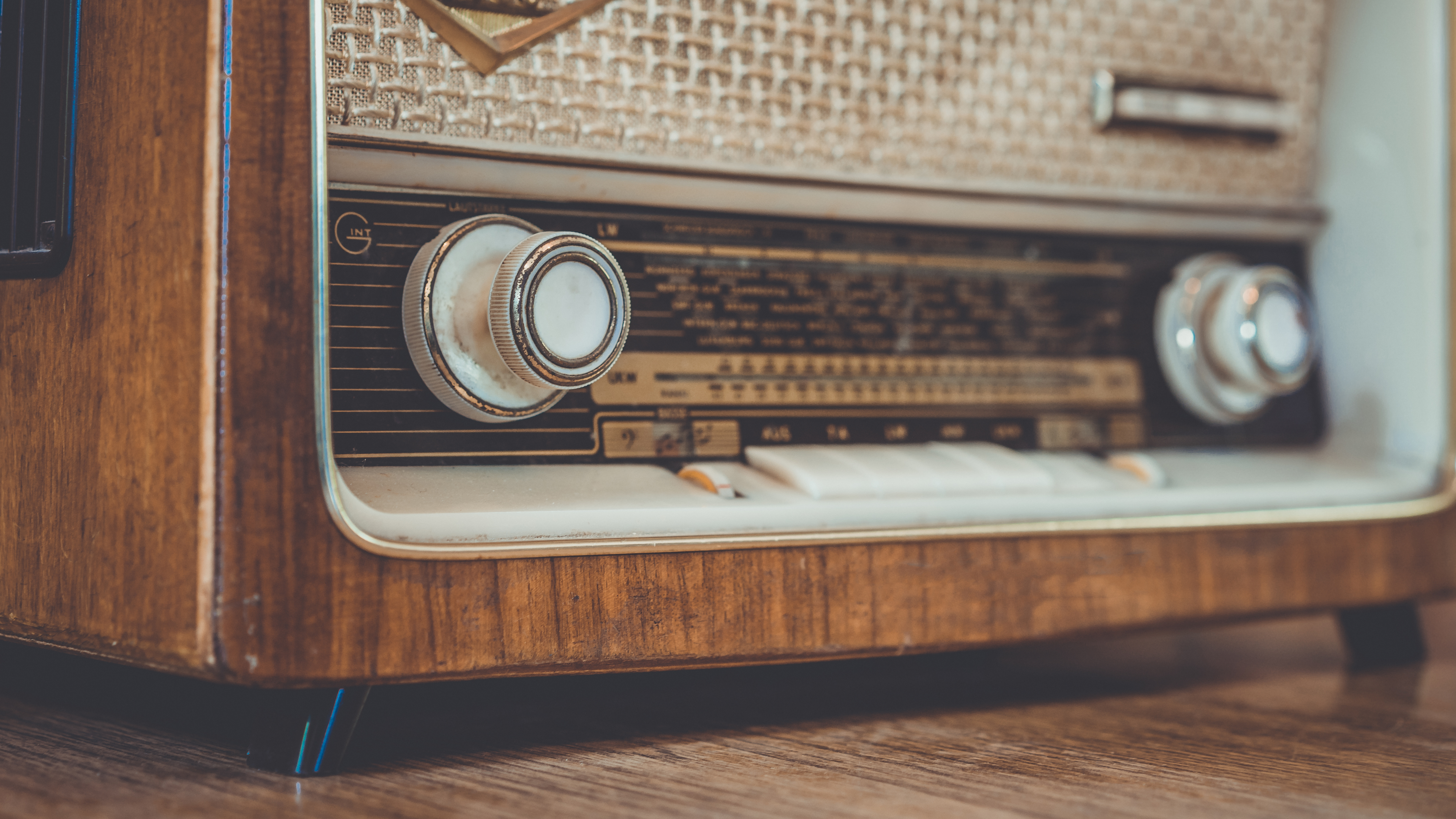 Vintage Radio On Wooden Table.