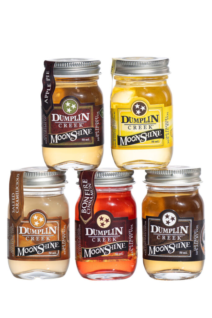 A variety pack of five mini moonshine jars in different flavours